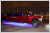 South Perth Foreshore Perth Hummer Limousine Stopover. Underbody neons are a hilite on this beautiful candy red Hummer Limousine.